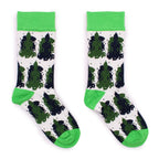 Pair of socks with green and black pattern on a white background