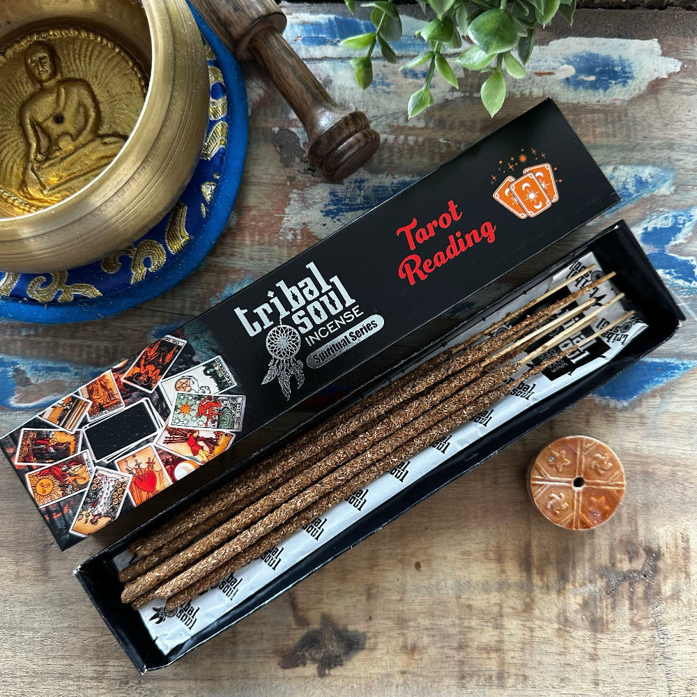 Box of Tribal Soul Incense with tarot cards and decorative items on a wooden surface