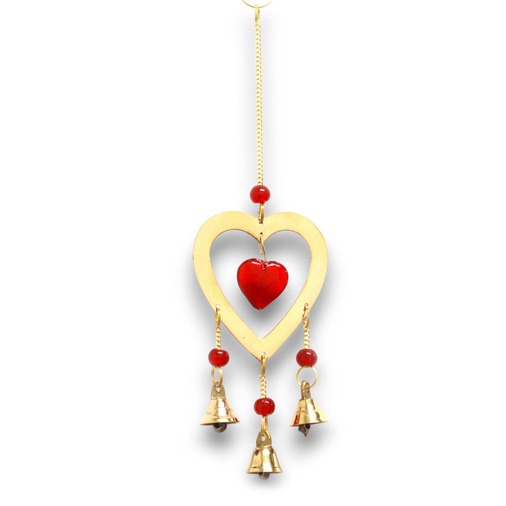 Decorative hanging heart with red heart and gold bells on a white background