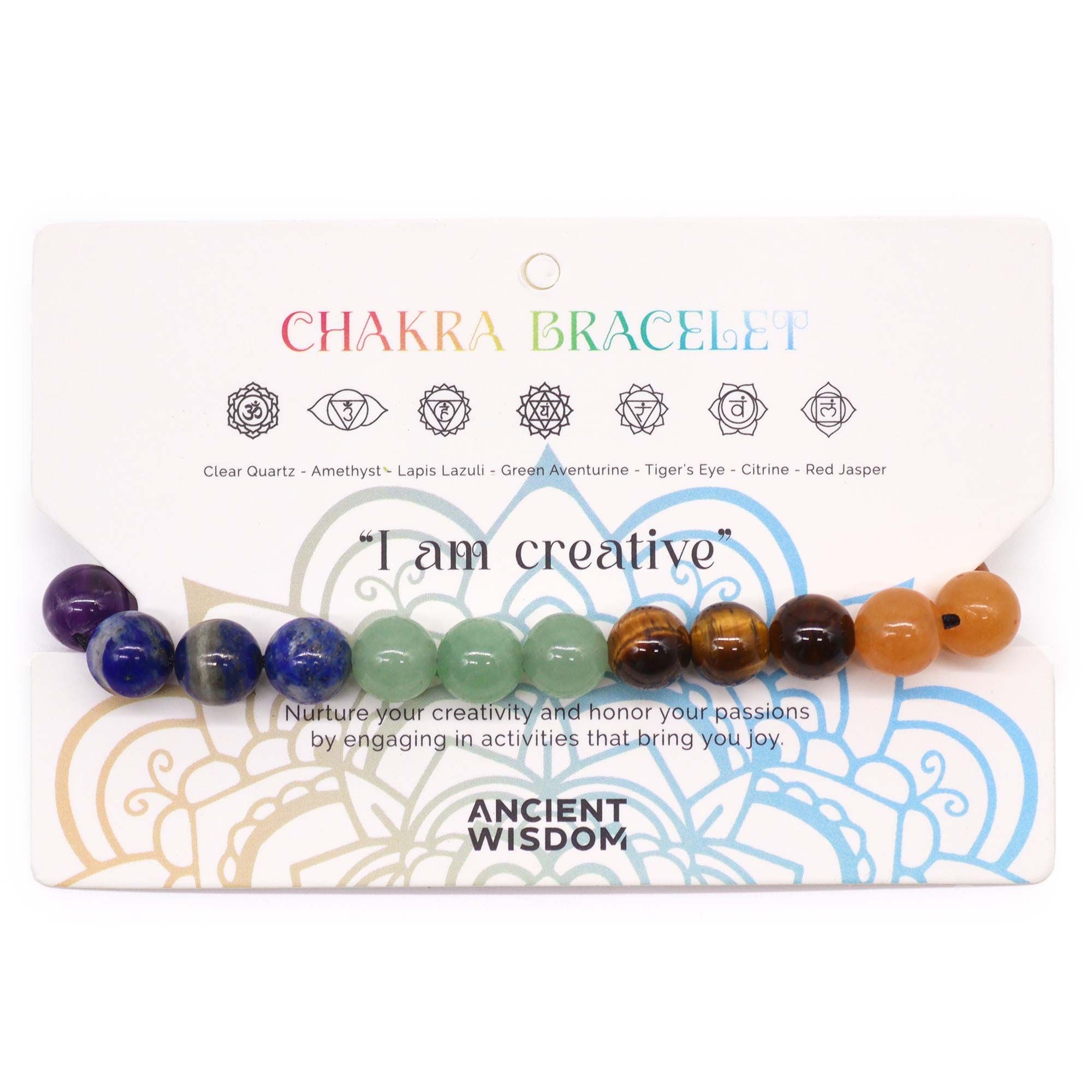 Chakra bracelet with colored beads on a packaging card featuring 'I am creative' text.