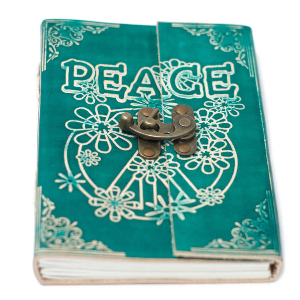 Turquoise notebook with 'PEACE' design and metal clasp on a white background