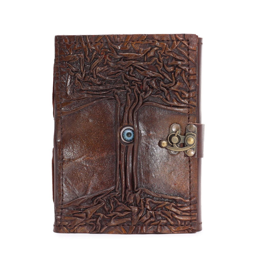 Brown leather journal with tree design and metal clasp on a white background