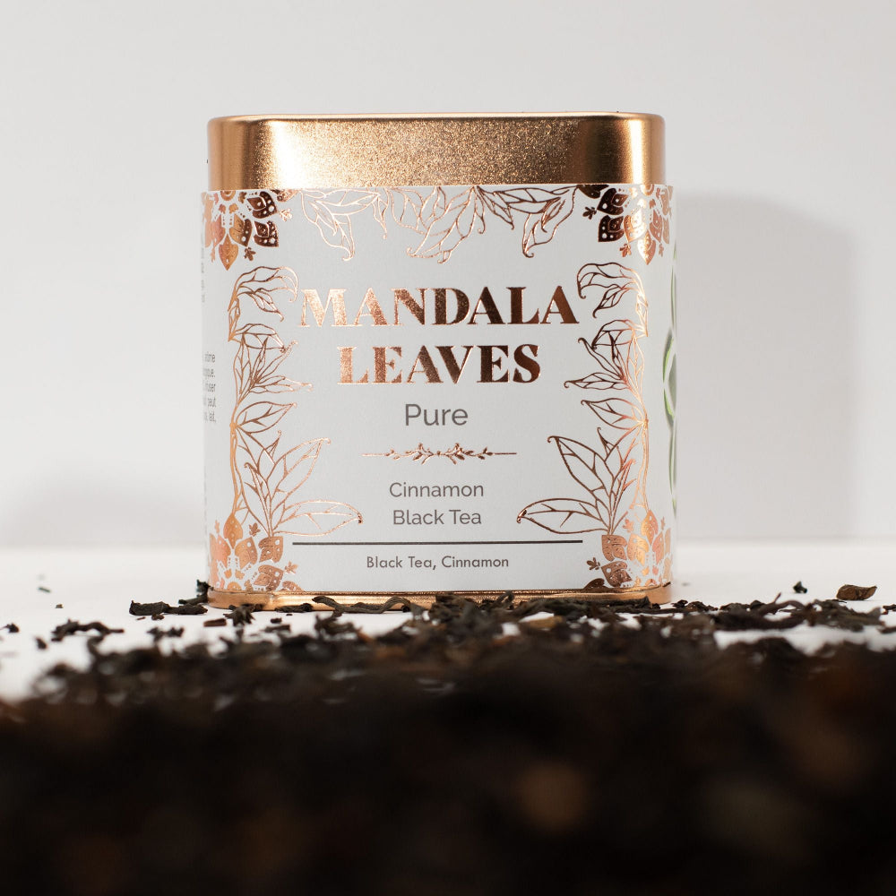 Tea canister labeled 'Mandala Leaves' with decorative design on a white background