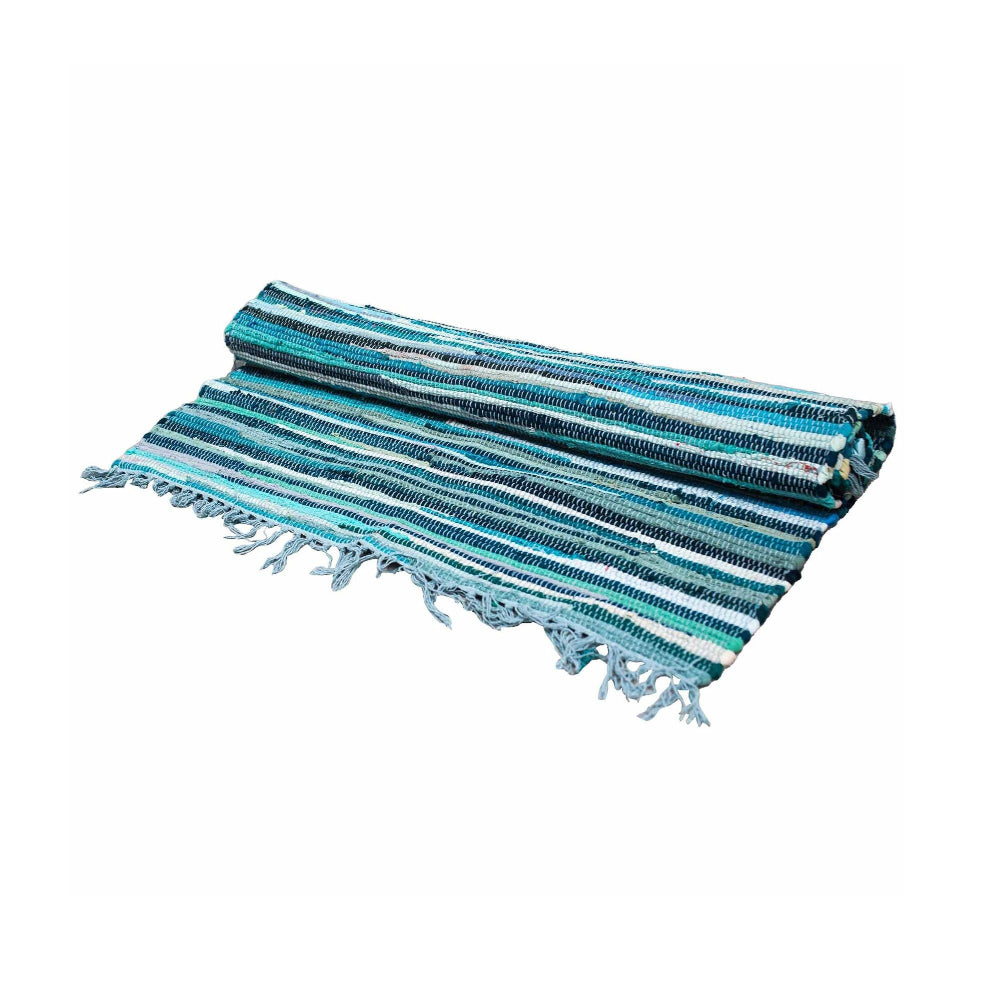 Striped blue and white towel with fringes on a white background
