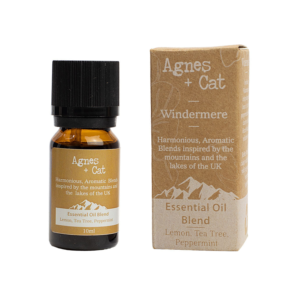 Agnes + Cat essential oil blend bottle and packaging on a white background
