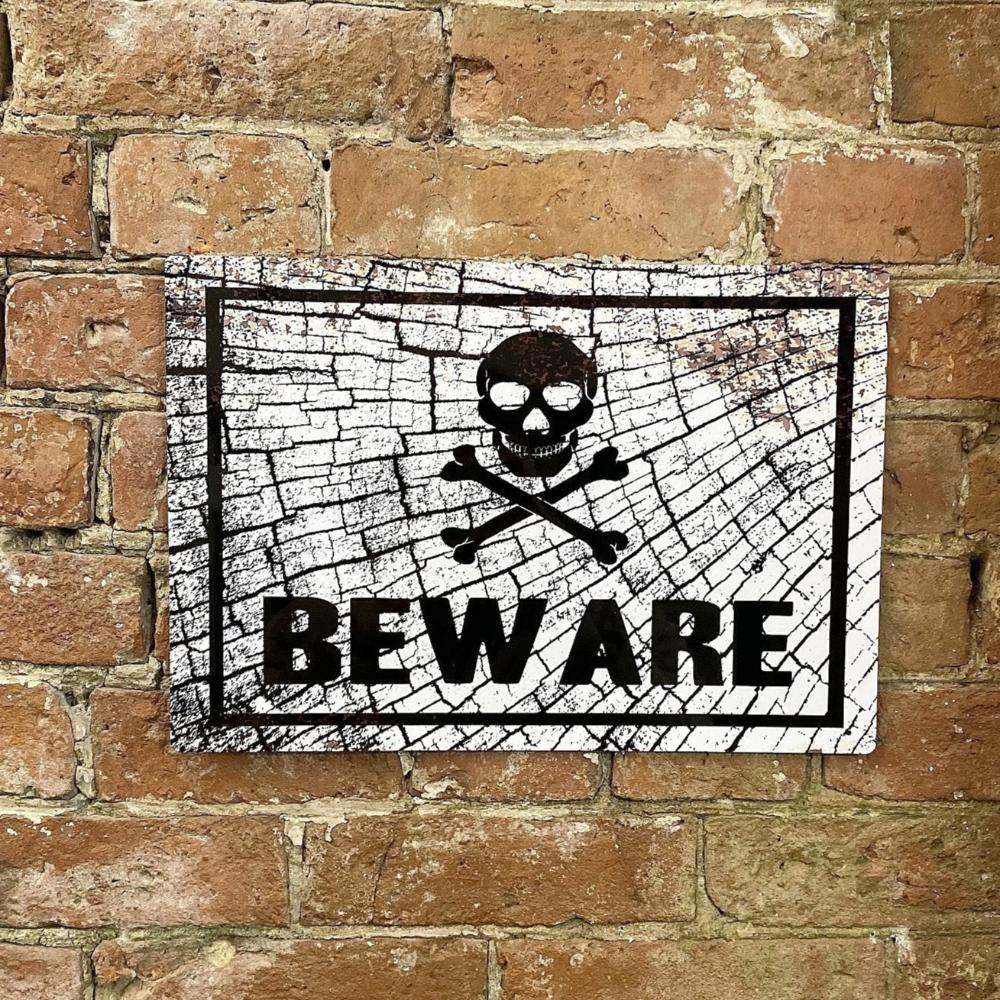 Eleanoras SKULL BEWARE METAL SIGN 