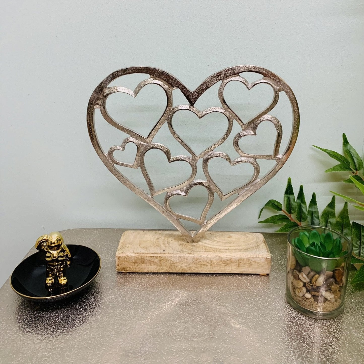 SILVER HEARTS ON A WOODEN BASE SMALL  from Eleanoras