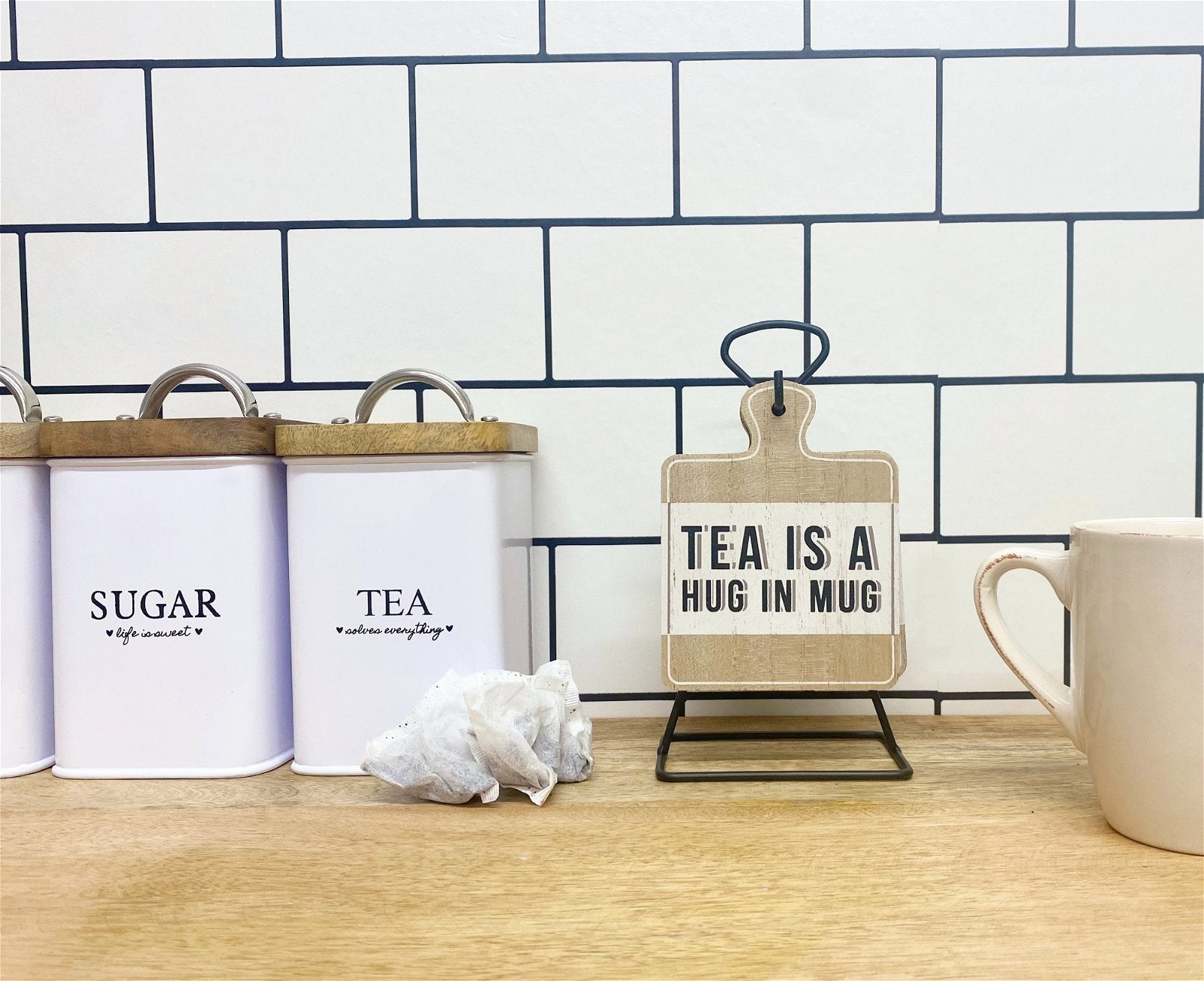 Eleanoras TEA SLOGAN SET OF 6 COASTERS ON METAL STAND 