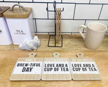 Eleanoras TEA SLOGAN SET OF 6 COASTERS ON METAL STAND 