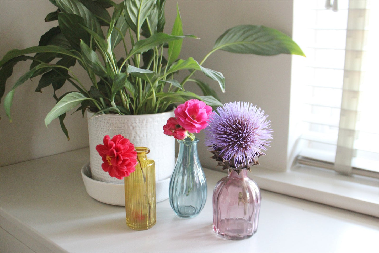 SET OF THREE COLOUR VASES