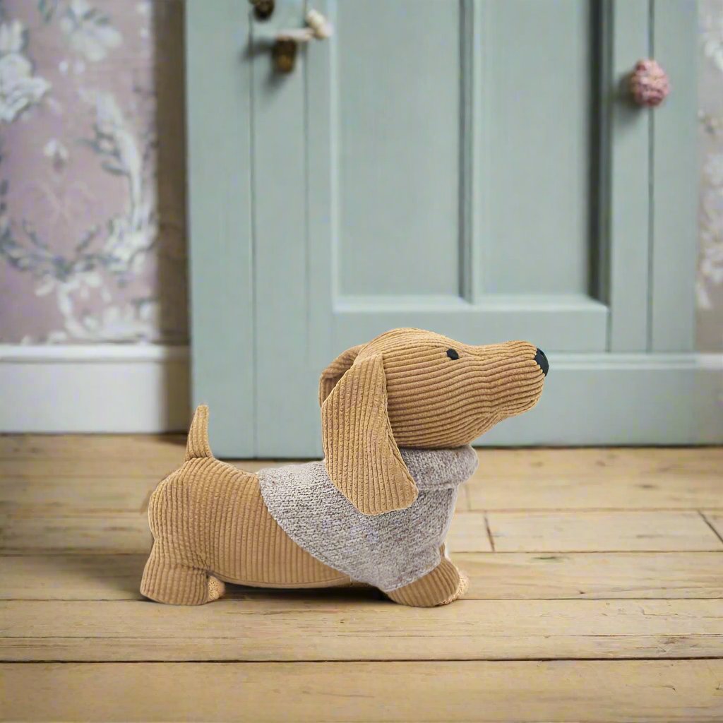 DOG WITH YELLOW JUMPER DOORSTOP