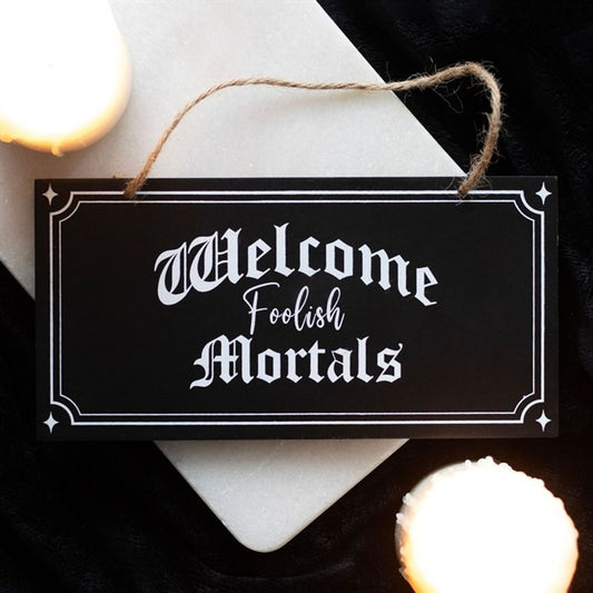 WELCOME FOOLISH MORTALS HANGING SIGN  from Eleanoras